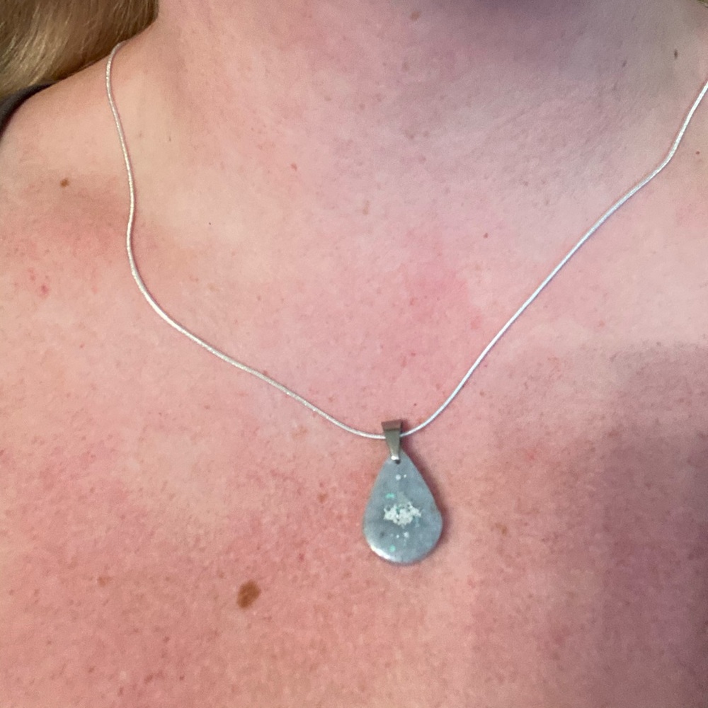 Reversible white sparkling charm with silver chain